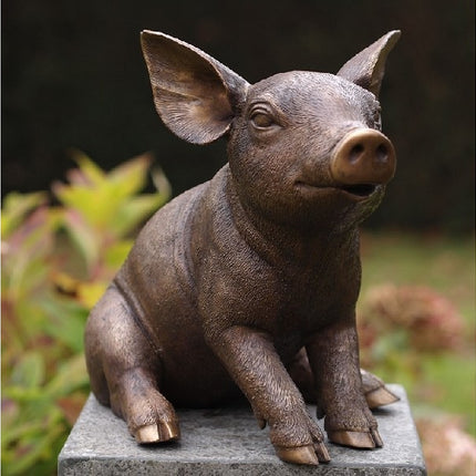 Bronzen beeld Zittend varken 29x24x34cm