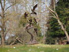 Bronzen beeld 8 papegaaien op boomstam 165x45x75cm