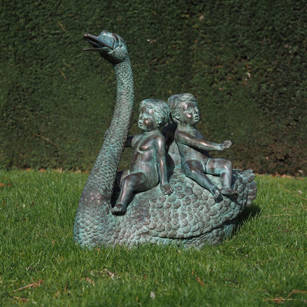 Bronzen beeld 3 Kinderen op Zwaan 85x55x90cm