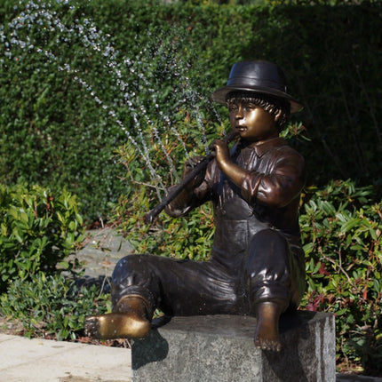 Bronzen beeld Jongen met blokfluit 70x64x68cm 25kg